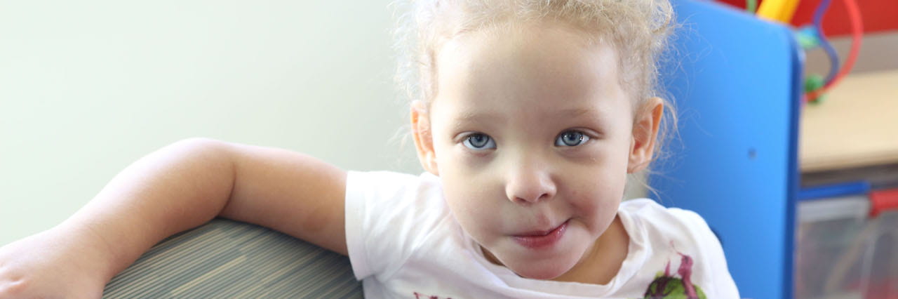 girl in flower shirt